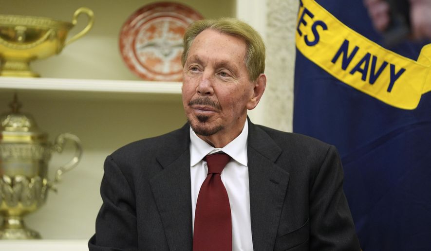 Larry Ellison, chairman and chief technology officer of Oracle Corp., sits in the Oval Office of the White House as President Donald Trump signs an executive order, Monday, Feb. 3, 2025, in Washington. (AP Photo/Evan Vucci, File)