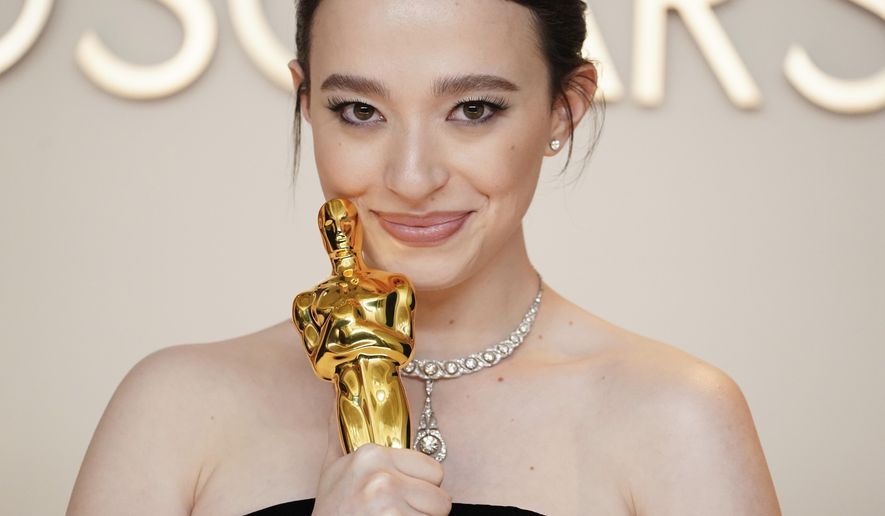 FILE - Mikey Madison, winner of the award for best performance by an actress in a leading role for "Anora," poses in the press room at the Oscars on March 2, 2025, in Los Angeles. (Photo by Jordan Strauss/Invision/AP, File)
