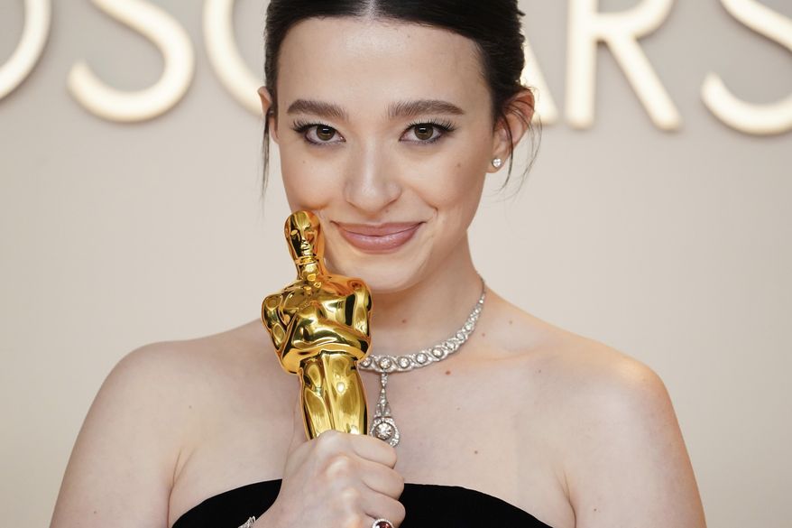 FILE - Mikey Madison, winner of the award for best performance by an actress in a leading role for "Anora," poses in the press room at the Oscars on March 2, 2025, in Los Angeles. (Photo by Jordan Strauss/Invision/AP, File)