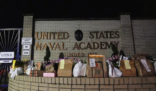 Food delivery orders are left near the entrance of the U.S. Naval Academy, Thursday, Sept. 11, 2025, in Annapolis, Md. (AP Photo/Stephanie Scarbrough)