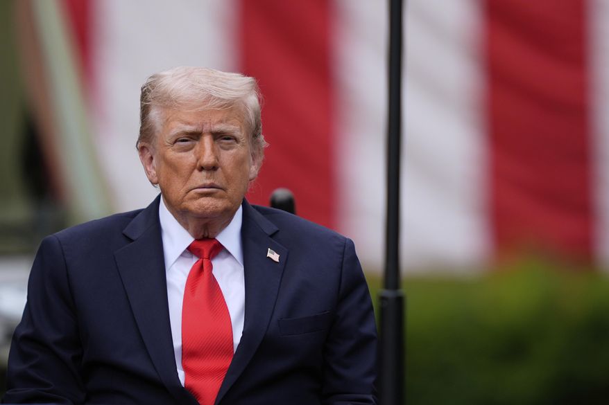 President Donald Trump listens as names are read as he attends a ceremony at the Pentagon in Washington to commemorate the 24th anniversary of the 9/11 attacks on Thursday, Sept. 11, 2025. (AP Photo/Julia Demaree Nikhinson) **FILE**