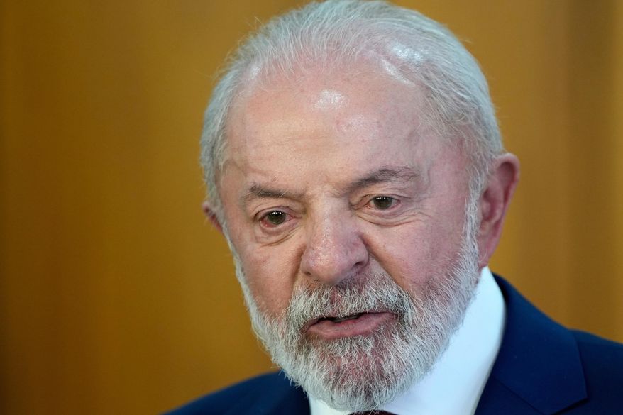 Brazil's President Luiz Inacio Lula da Silva gives a joint statement with Nigeria's President Bola Tinubu, at Planalto presidential palace, in Brasilia, Brazil, on Aug. 25, 2025. (AP Photo/Eraldo Peres, File)