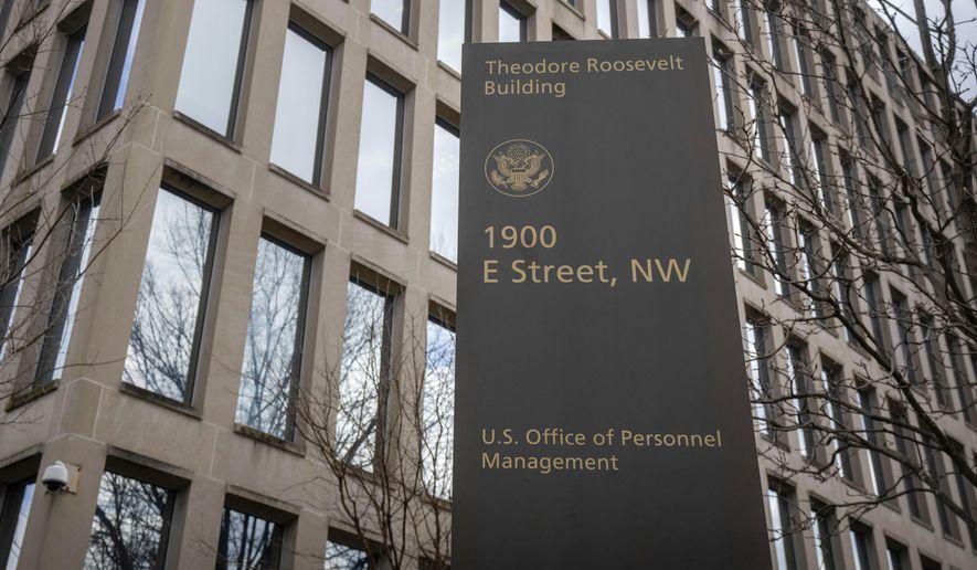 The Theodore Roosevelt Building, location of the U.S. Office of Personnel Management, is pictured, Feb. 13, 2024, in Washington. (AP Photo/Mark Schiefelbein, File)