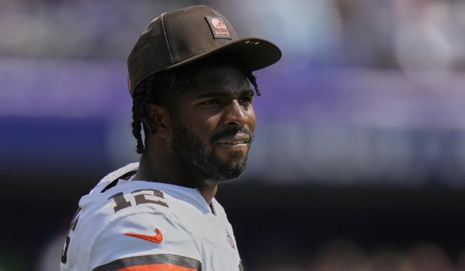 Cleveland Browns quarterback Shedeur Sanders watches during the first half of an NFL football game against the Baltimore Ravens, Sunday, Sept. 14, 2025, in Baltimore. (AP Photo/Stephanie Scarbrough)