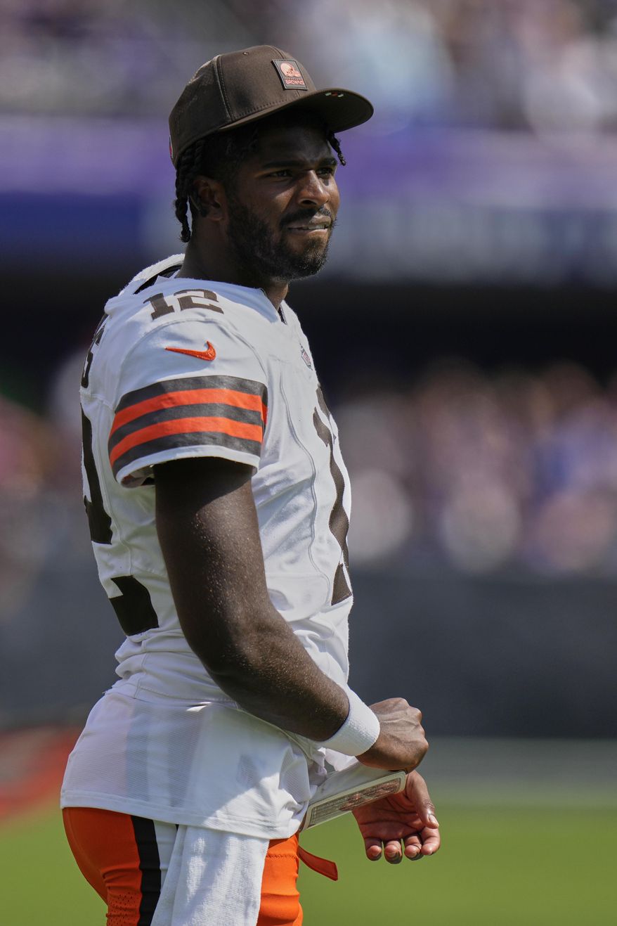 Cleveland Browns quarterback Shedeur Sanders watches during the first half of an NFL football game against the Baltimore Ravens, Sunday, Sept. 14, 2025, in Baltimore. (AP Photo/Stephanie Scarbrough)