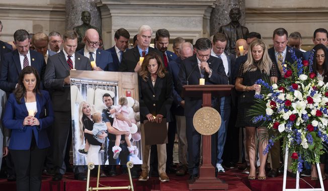 Speaker of the House Mike Johnson, R-La., leads a memorial vigil to honor conservative activist Charlie Kirk who was shot and killed at an event in Utah last week, at the Capitol in Washington, Monday, Sept. 15, 2025. (AP Photo/J. Scott Applewhite)