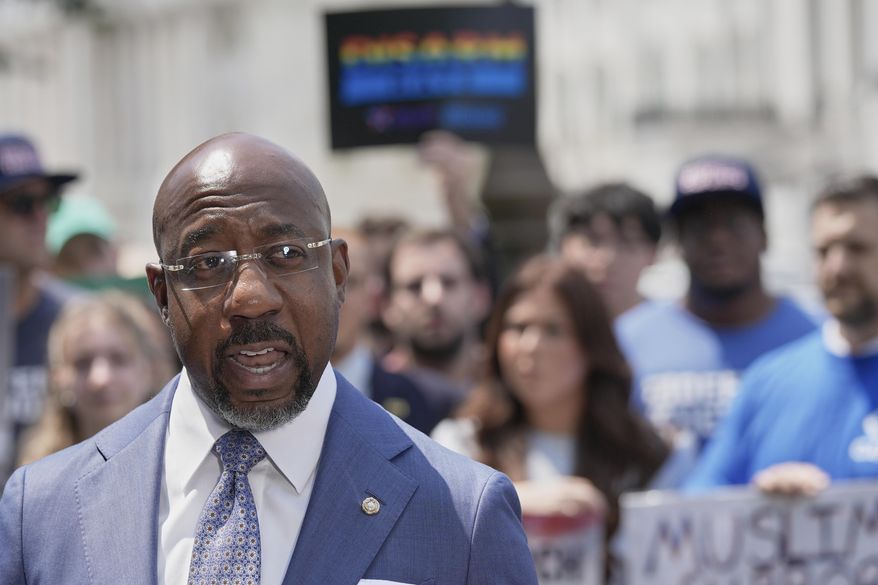 Sen. Raphael Warnock, D-Ga., speaks during a news conference on the Voting Rights Advancement Act, on Capitol Hill Tuesday, July 29, 2025, in Washington. (AP Photo/Mariam Zuhaib, File)