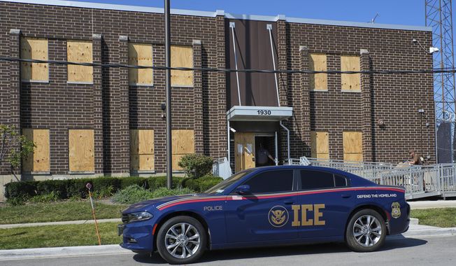 A U.S. Immigration and Customs Enforcement's (ICE) vehicle is parked in front of an ICE processing facility in the Chicago suburb of Broadview, Ill., Wednesday, Sept. 17, 2025. (AP Photo/Nam Y. Huh)