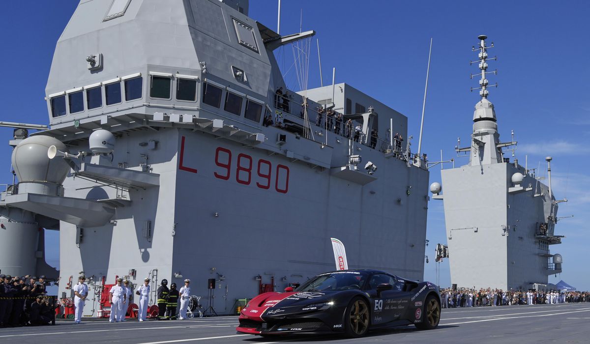 NextImg:One man in an Italian supercar atop an aircraft carrier. And a record in his sights