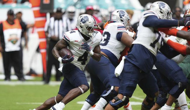 Howard running back Travis Kerney (4) runs during the first half of the Orange Blossom Classic NCAA college football game against Florida A&M, Saturday, Aug. 30, 2025, in Miami Gardens, Fla. (AP Photo/Lynne Sladky) **FILE**