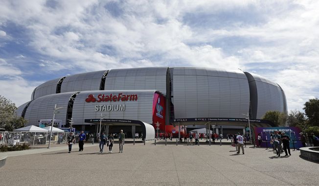 The exterior of State Farm Stadium is seen before the NFL Super Bowl 57 football game in Glendale, Ariz., on Sunday, Feb. 12, 2023. (AP Photo/Adam Hunger, File)