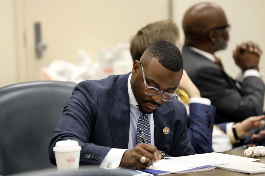 State Rep. Hamilton Grant, D-Columbia, takes notes during a meeting of the Legislative Black Caucus, Tuesday, Jan. 14, 2025, in Columbia, S.C. (AP Photo/Jeffrey Collins, File)