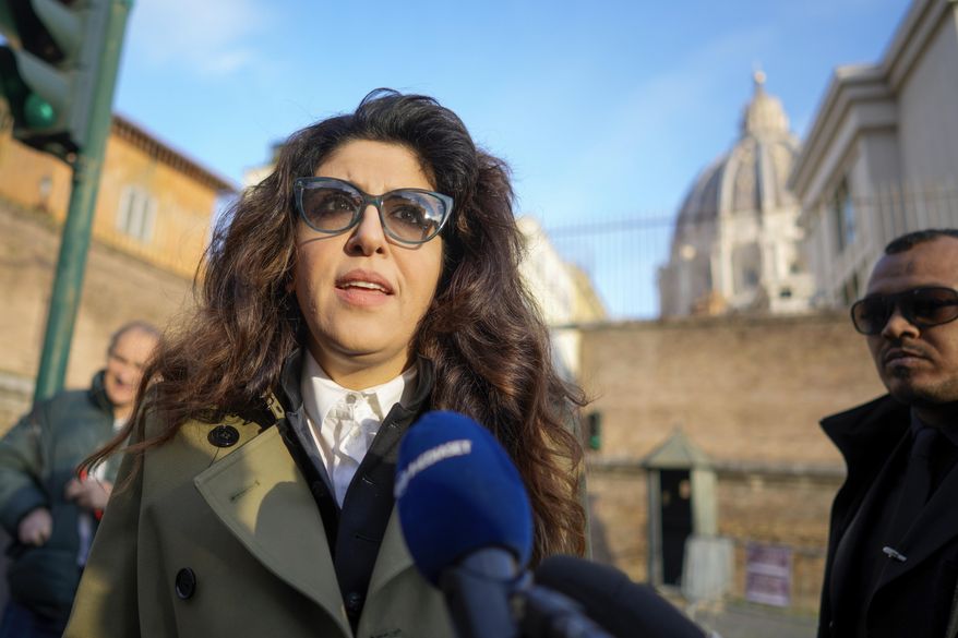 FILE - Public relations specialist Francesca Chaouqui talks to reporters as she arrives to testify in a trial at the Vatican, Jan. 13, 2023. (AP Photo/Andrew Medichini, File)
