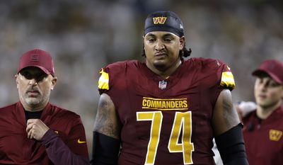 Washington Commanders guard Brandon Coleman heads to the locker room after being injured during the first half of an NFL football game against the Green Bay Packers Thursday, Sept. 11, 2025, in Green Bay, Wis. (AP Photo/Matt Ludtke) ** FILE **