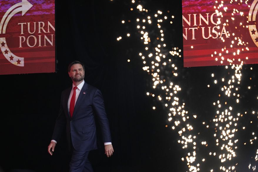 Vice President JD Vance arrives on stage to speak at a memorial for conservative activist Charlie Kirk, Sunday, Sept. 21, 2025, at State Farm Stadium in Glendale, Ariz. (AP Photo/John Locher)