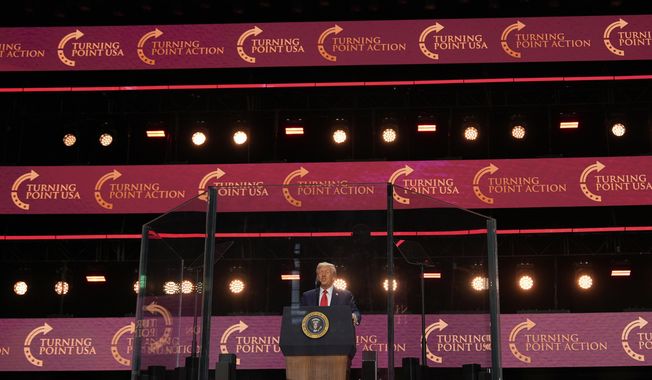 President Donald Trump speaks at a memorial for conservative activist Charlie Kirk, Sunday, Sept. 21, 2025, at State Farm Stadium in Glendale, Ariz. (AP Photo/Julia Demaree Nikhinson)