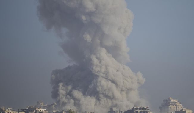 Smoke rises following an explosion in the Gaza Strip, as seen from southern Israel, Sunday, Sept. 21, 2025. (AP Photo/Ohad Zwigenberg)
