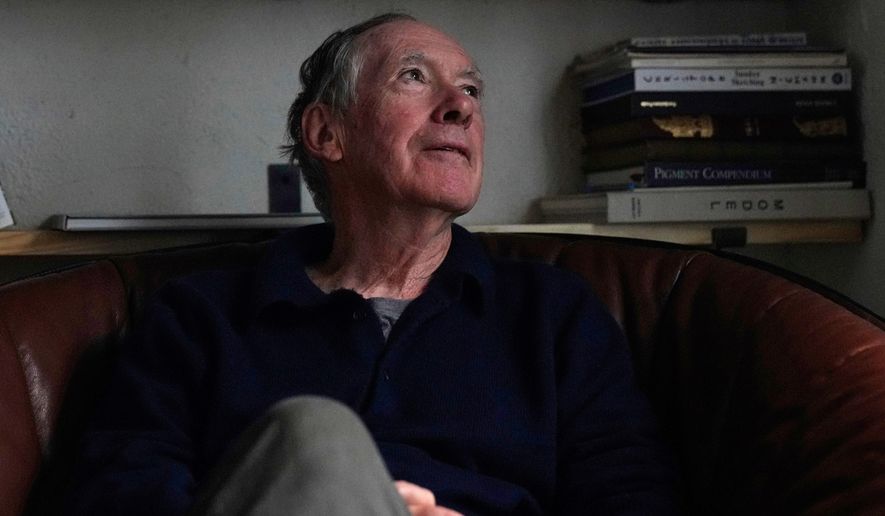 Ian McEwan, British novelist and screenwriter, gestures as he speaks to press during an interview in London, Friday, Sept. 12, 2025. (AP Photo/Joanna Chan)