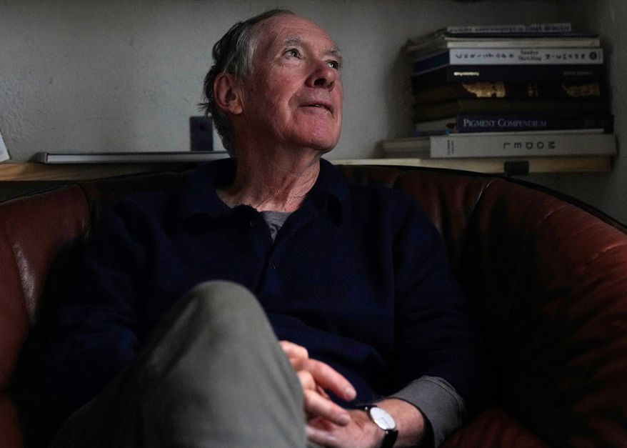Ian McEwan, British novelist and screenwriter, gestures as he speaks to press during an interview in London, Friday, Sept. 12, 2025. (AP Photo/Joanna Chan)