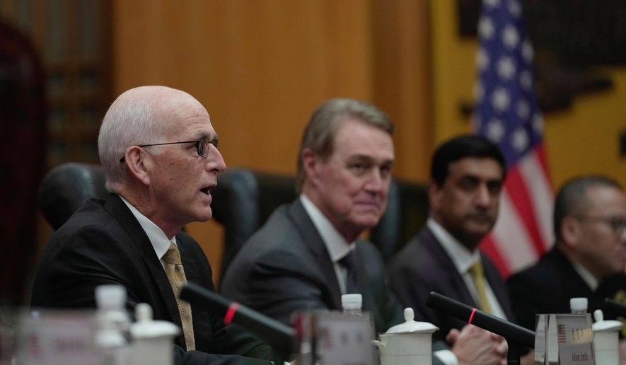 U.S. Rep. Adam Smith, D-Wash, left, speaks as he leads a bipartisan group of U.S. lawmakers for a meeting with the Chinese Defense Minister Dong Jun, unseen, at the Ministry of Defense in Beijing, China, Monday, Sept. 22, 2025. (AP Photo/Mahesh Kumar A., Pool)