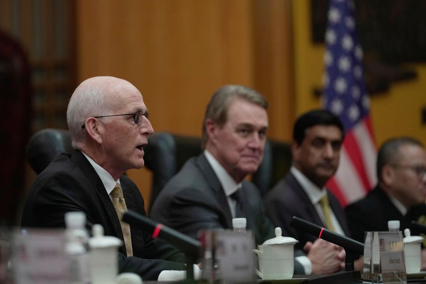 U.S. Rep. Adam Smith, D-Wash, left, speaks as he leads a bipartisan group of U.S. lawmakers for a meeting with the Chinese Defense Minister Dong Jun, unseen, at the Ministry of Defense in Beijing, China, Monday, Sept. 22, 2025. (AP Photo/Mahesh Kumar A., Pool)