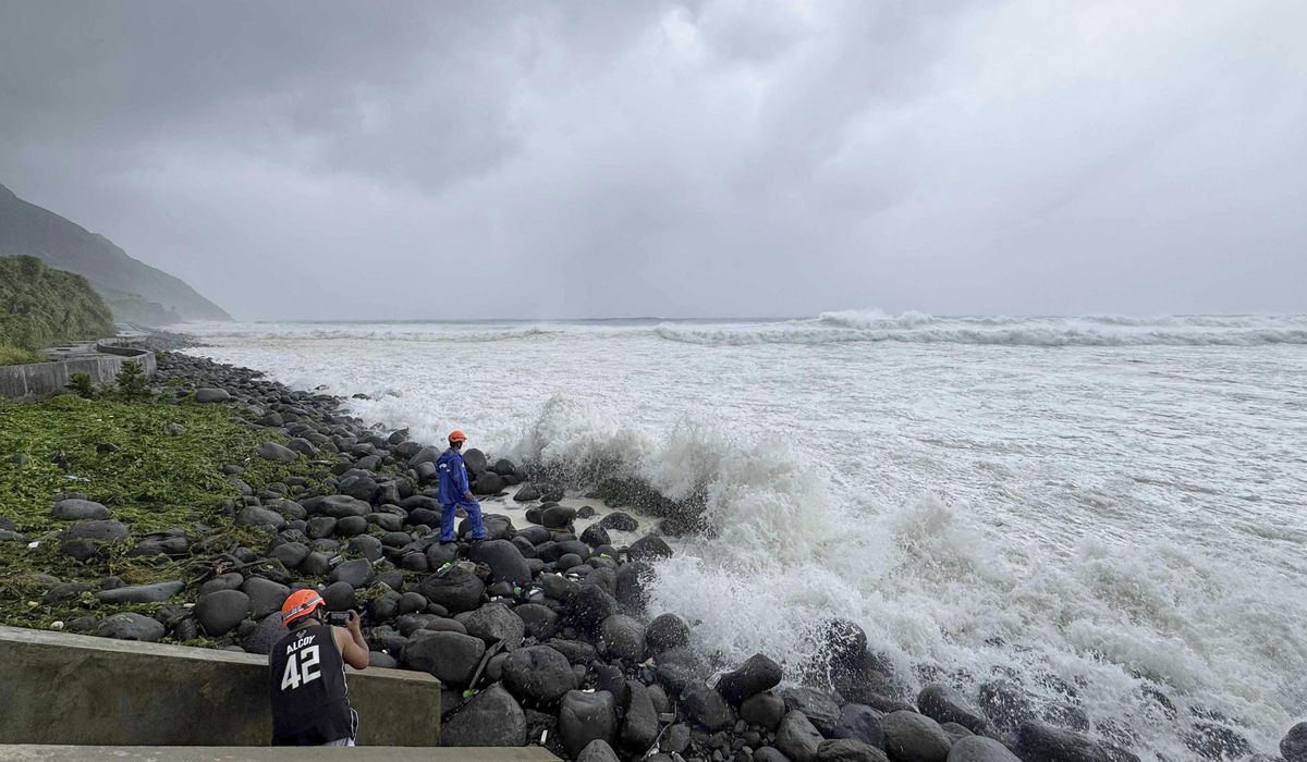 NextImg:Super typhoon blowing by northern Philippines and Taiwan forces evacuations and closures