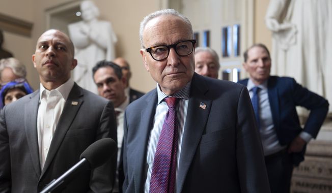 House Democratic Leader Hakeem Jeffries, left, and Senate Democratic Leader Chuck Schumer, both of New York, tell reporters that they are united as the Sept. 30 funding deadline approaches, at the Capitol in Washington, Thursday, Sept. 11, 2025. (AP Photo/J. Scott Applewhite)