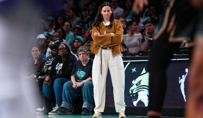New York Liberty coach Sandy Brondello watches the first half of Game 2 in the first round of the WNBA basketball playoffs against the Phoenix Mercury, Wednesday, Sept. 17, 2025, in New York. (AP Photo/Angelina Katsanis)