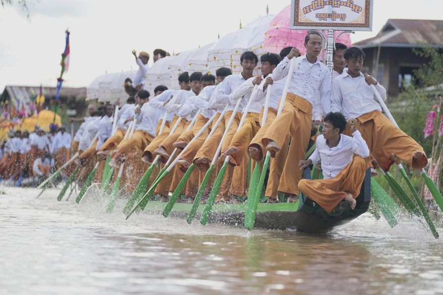Ethnic Intha people perform during Phaung Daw Oo pagoda festival in Inle Lake, southern Shan State, Myanmar, Tuesday, Sept. 23, 2025. (AP Photo/Thein Zaw)
