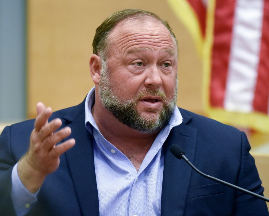 Conspiracy theorist Alex Jones takes the witness stand to testify at the Sandy Hook defamation damages trial at Connecticut Superior Court in Waterbury, Conn., on Sept. 22, 2022. (Tyler Sizemore/Hearst Connecticut Media via AP, Pool) **FILE**