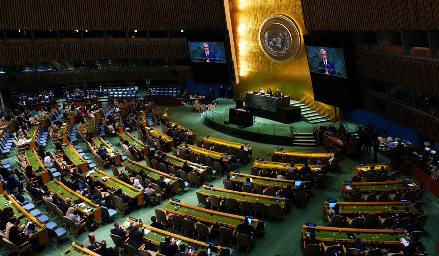 Canada's Prime Minister Mark Carney delivers a speech as he takes part in a high-level international conference for the peaceful settlement of Palestinians and the implementation of the two-state solution during the United Nations General Assembly at U.N. headquarters, Monday, Sept. 22, 2025. (Sean Kilpatrick/The Canadian Press via AP)