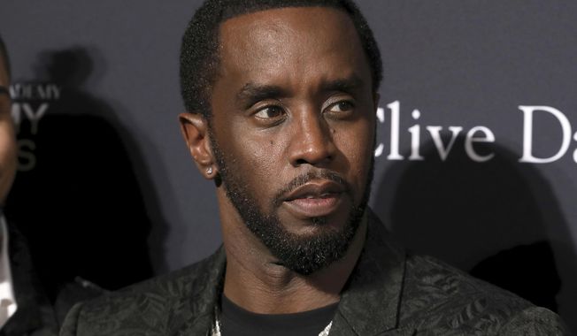 Sean Combs arrives at the Pre-Grammy Gala And Salute To Industry Icons at the Beverly Hilton Hotel on Saturday, Jan. 25, 2020, in Beverly Hills, Calif. (Photo by Mark Von Holden/Invision/AP, File)