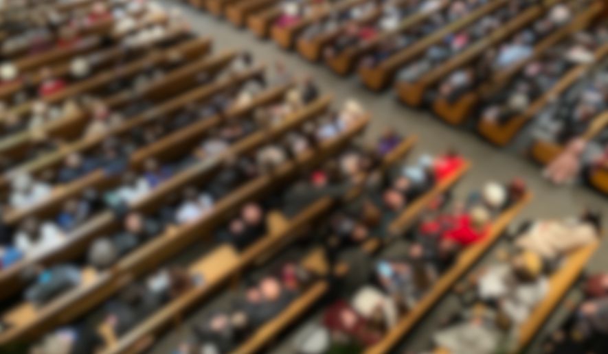 Church members in pews from above inside the sanctuary. File photo credit: ZikG via Shutterstock.