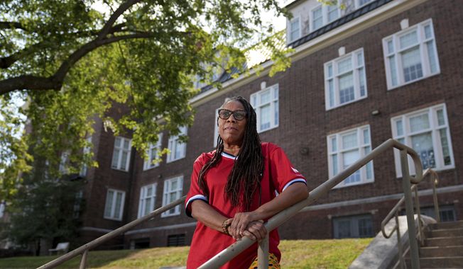 Thomasina Clarke poses for a photo outside Sumner High School Sept. 18, 2025, in St. Louis. (AP Photo/Jeff Roberson)