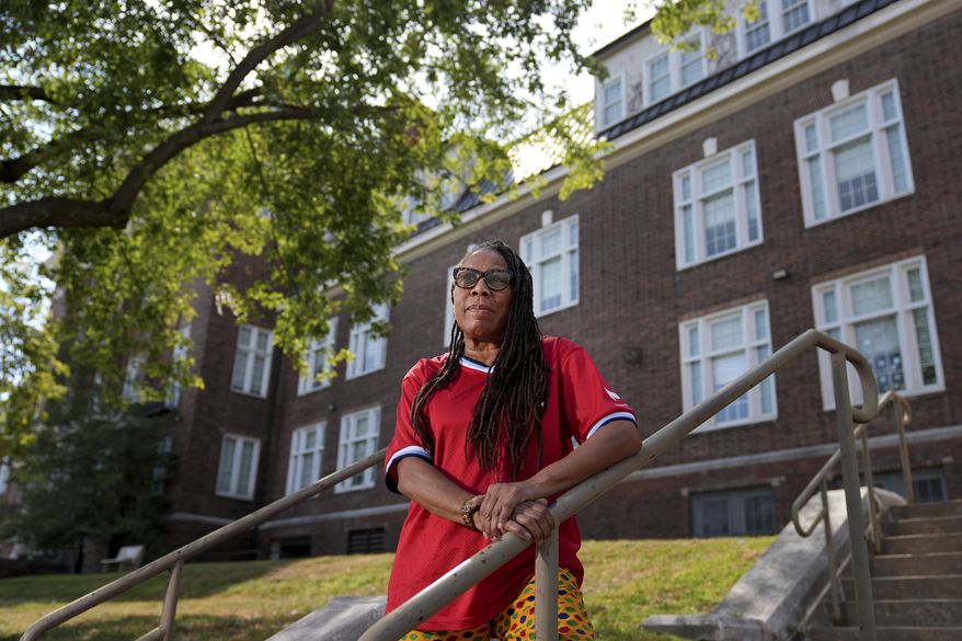 Thomasina Clarke poses for a photo outside Sumner High School Sept. 18, 2025, in St. Louis. (AP Photo/Jeff Roberson)