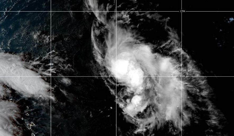 This satellite image provided by NOAA taken Wednesday, Sept. 24, 2025, at 4:10 p.m. EDT, shows Tropical Storm Humberto in the Atlantic Ocean, off the southeast coast of the United States. (NOAA via AP)