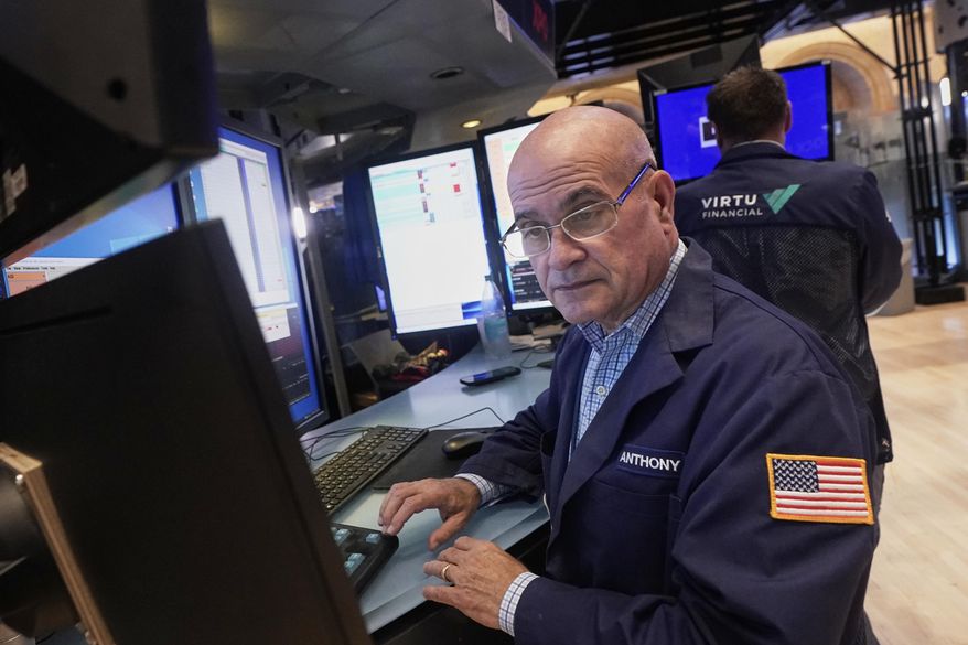 Trader Anthony Confusione works on the floor of the New York Stock Exchange, Wednesday, Sept. 17, 2025. (AP Photo/Richard Drew)