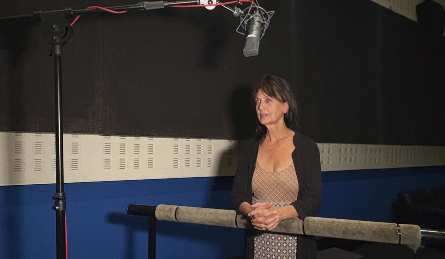 Francoise Cadol poses in a dubbing studio, in Saint Denis, outside Paris, France, Monday, Sept. 15, 2025. (AP Photo/Nicolas Garriga)