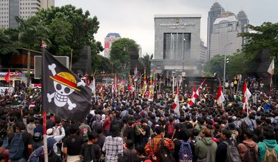 Protesters from France to Nepal are using a common symbol: a pirate flag from the long-running Japanese comic “One Piece.” (File photo credit: Toto Santiko Budi via Shutterstock)
