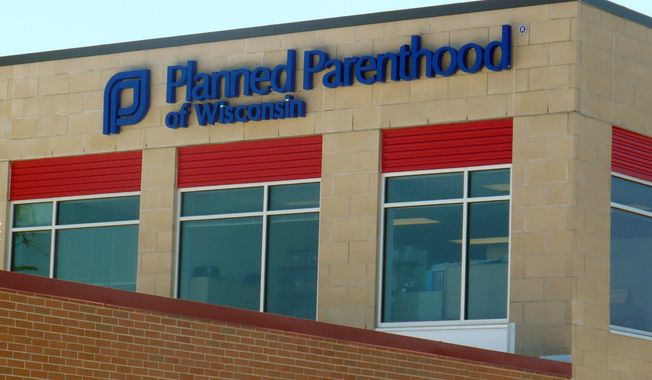 FILE - This undated photo shows the Madison South Health Center that is owned and operated by Planned Parenthood of Wisconsin, in Madison. (AP Photo/Kevin Wang)