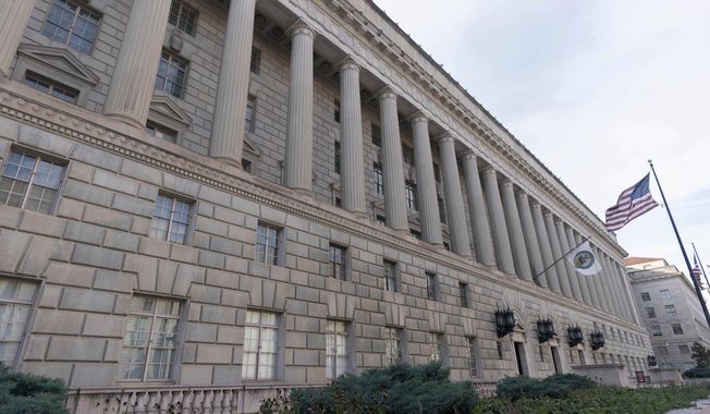 The U. S. Department of Commerce building is seen in Washington, Dec. 7, 2024. (AP Photo/Jose Luis Magana) **FILE**