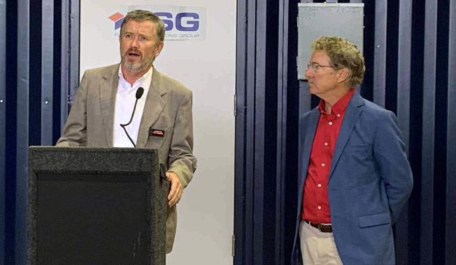 Rep. Thomas Massie, R-Ky., speaks at a regional forum as Sen. Rand Paul, R-Ky., watches on Wednesday, Sept. 24, 2025 in Wurtland, Ky. (Aaron Snyder/The Daily Independent via AP)