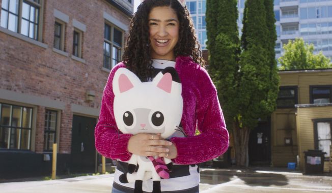 This image released by Universal Pictures shows Laila Lockhart Kraner as Gabby in a scene from DreamWorks Animation's "Gabby's Dollhouse: The Movie." (Universal Pictures/DreamWorks Animation via AP)