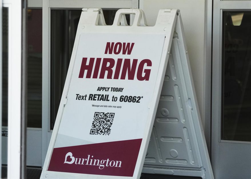 "Now Hiring" sign is displayed at a retail store in Schaumburg, Ill., Thursday, Sept. 18, 2025. (AP Photo/Nam Y. Huh) ** FILE **