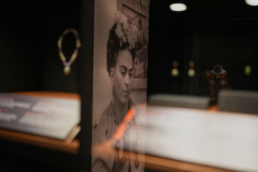 A portrait of Frida Kahlo by Mexican photographer Wallace Marly is displayed in the new museum Casa Kahlo, a house bought by Kahlo’s father after he gave the iconic Casa Azul to his daughter as a wedding gift, in Mexico City, Wednesday, Sept. 10, 2025. (AP Photo/Eduardo Verdugo)