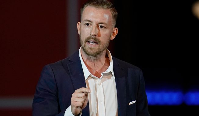 FILE - Ryan Walters, Republican candidate for Oklahoma State Superintendent, speaks at a rally, Nov. 1, 2022, in Oklahoma City. (AP Photo/Sue Ogrocki, File)