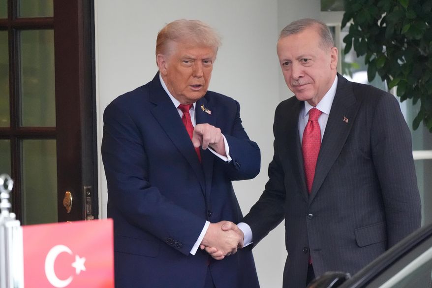 President Donald Trump greets Turkish President Recep Tayyip Erdogan at the White House, Thursday, Sept. 25, 2025, in Washington. (AP Photo/Alex Brandon)