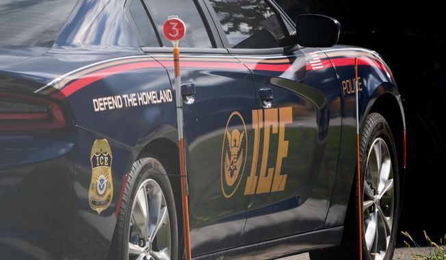 An Immigration and Customs Enforcement vehicle is parked outside the U.S. Immigration and Customs Enforcement (ICE) building Wednesday, Sept. 24, 2025, in Broadview, Ill. (AP Photo/Erin Hooley)