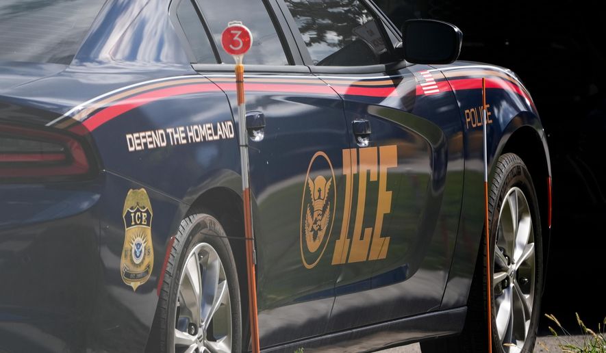 An Immigration and Customs Enforcement vehicle is parked outside the U.S. Immigration and Customs Enforcement (ICE) building Wednesday, Sept. 24, 2025, in Broadview, Ill. (AP Photo/Erin Hooley)