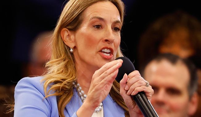 FILE - Democrat Mikie Sherrill responds to questions during the first general election gubernatorial debate with Republican opponent Jack Ciattarelli, Sept. 21, 2025, in Lawrenceville, N.J. (AP Photo/Noah K. Murray, File)
